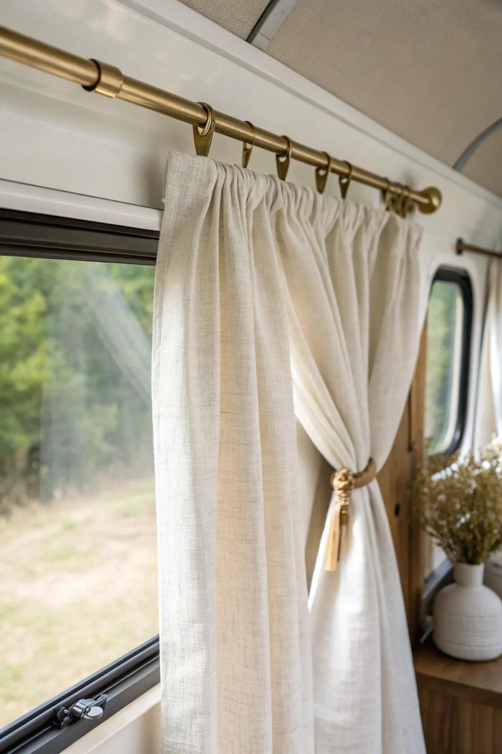 Rod-pocket camper curtain: airy linen on a brass tension rod—tidy, minimal, and easy.