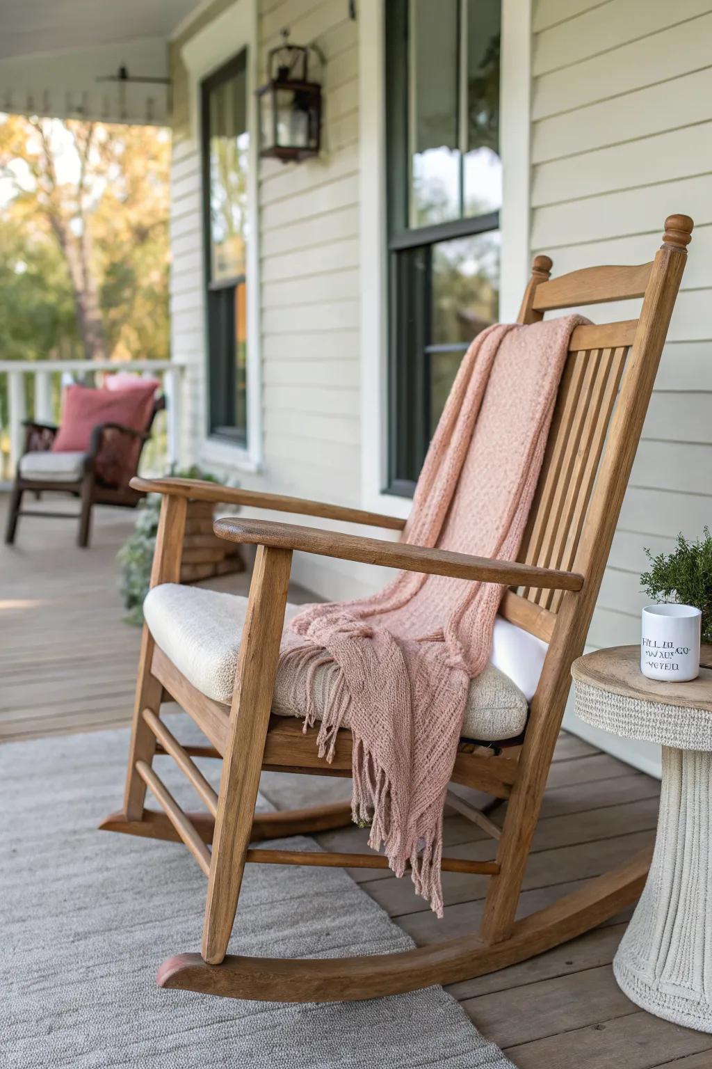 Timeless rocking chair styling for tiny porches—angle it in and add a micro table for a chat zone.