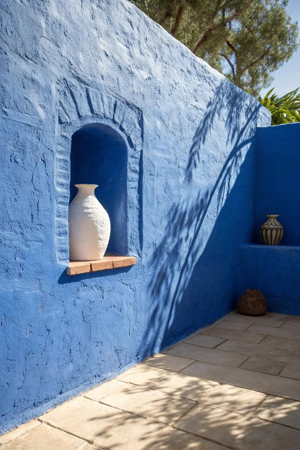 One bold cobalt stucco wall instantly turns a tiny patio into a chic Mexican courtyard.