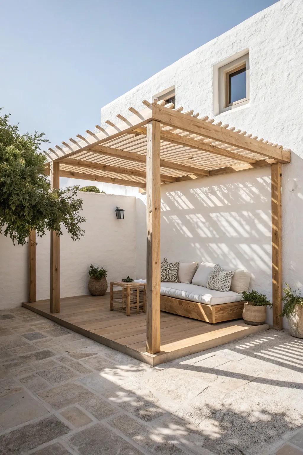 A compact freestanding pergola defines a tiny patio as a serene, outdoor living room.