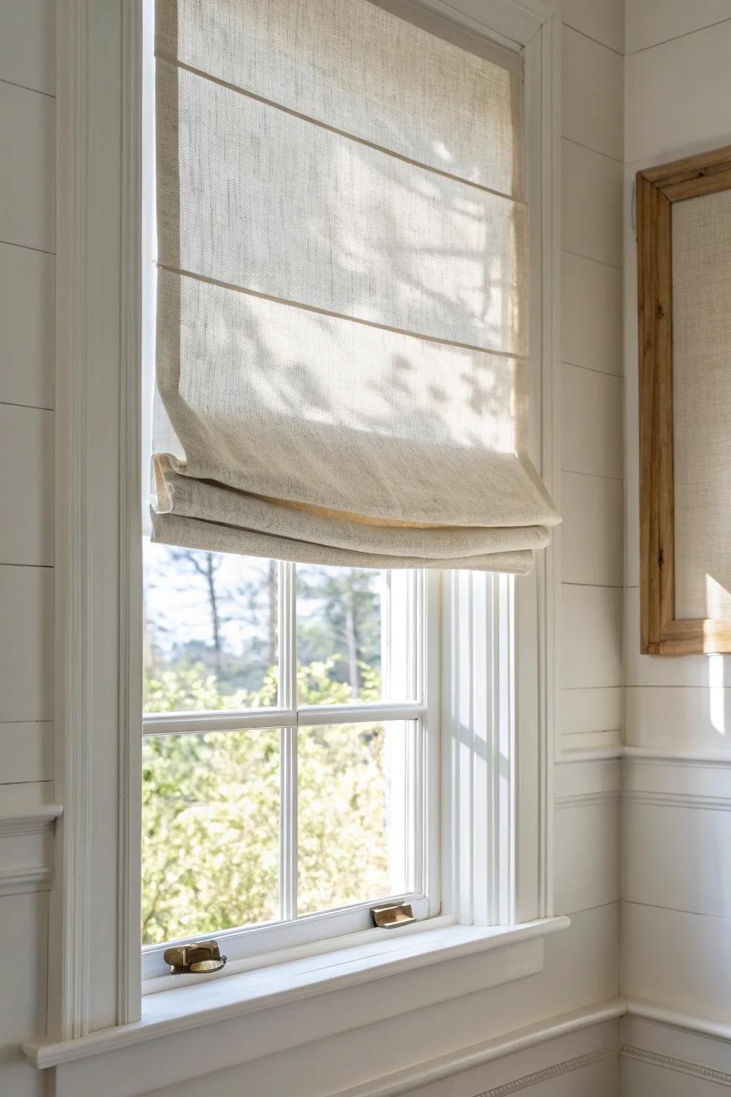A classic linen Roman shade adds a polished, tailored finish to even the smallest window.
