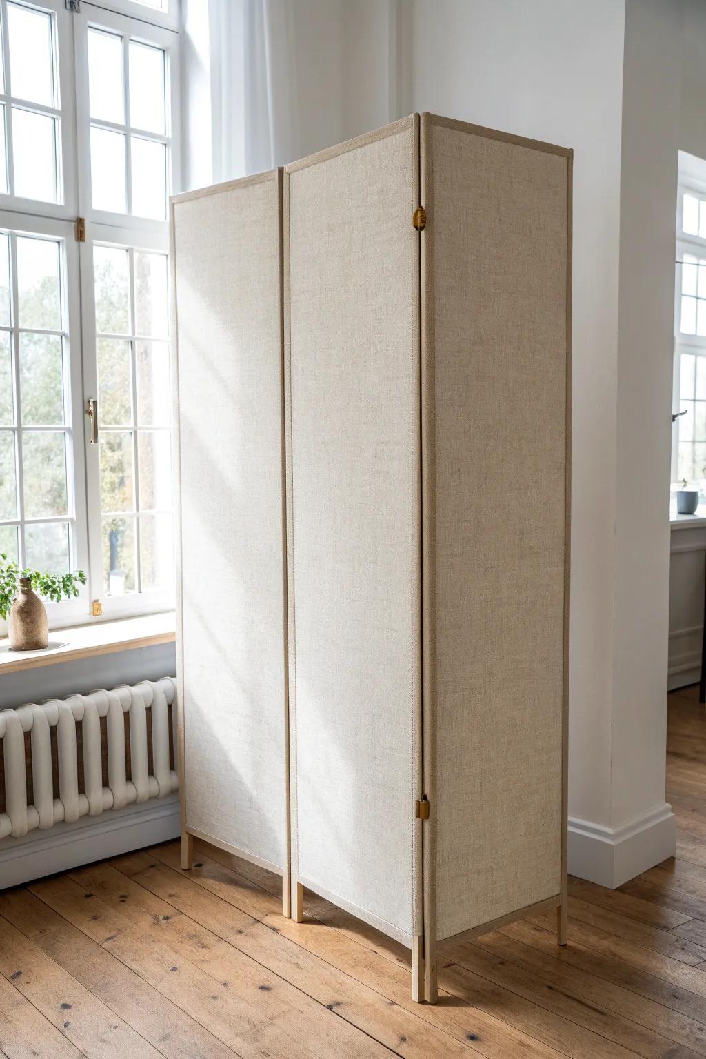 DIY fabric-wrapped foam divider: a smooth, dent-resistant temporary wall that looks custom.