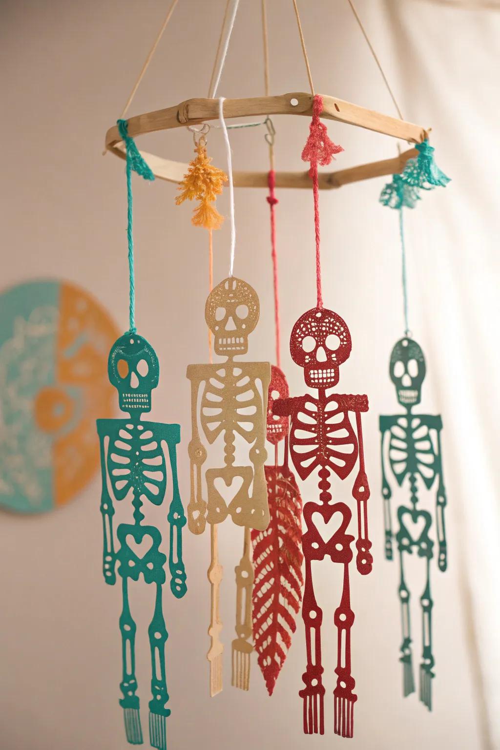 Add a whimsical touch to your decor with this stunning skeleton mobile, where bold colors meet minimalist elegance.