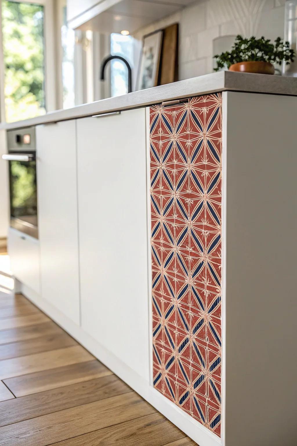 Peel-and-stick wallpaper on the cabinet end adds a bold, designed accent—no full wall needed.