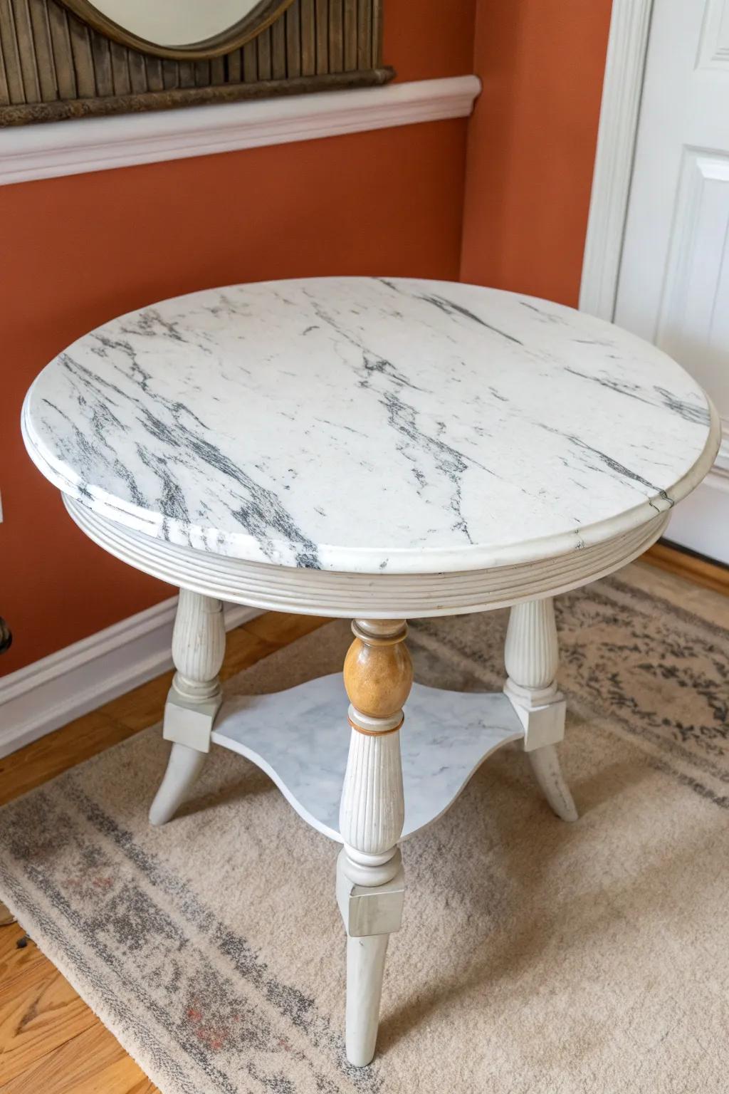 Thrifted table glow-up: a faux marble painted top for a luxe look without the stone price.
