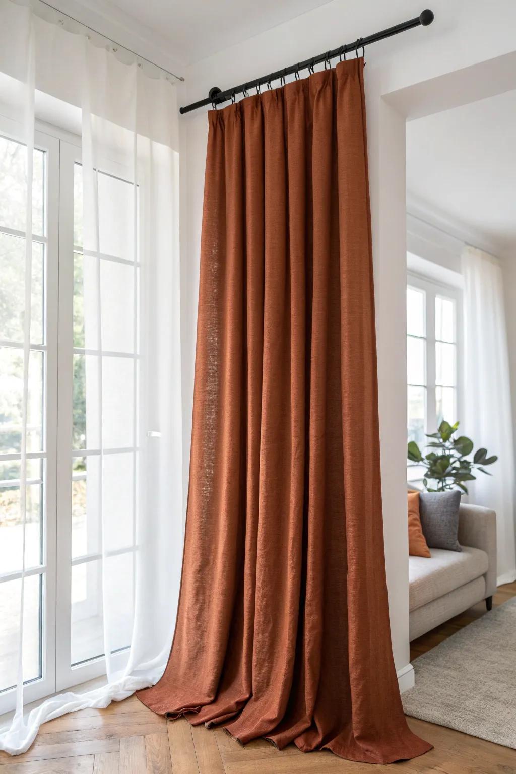Hang curtains high and wide to add instant height—linen drapes make small rooms feel grand.