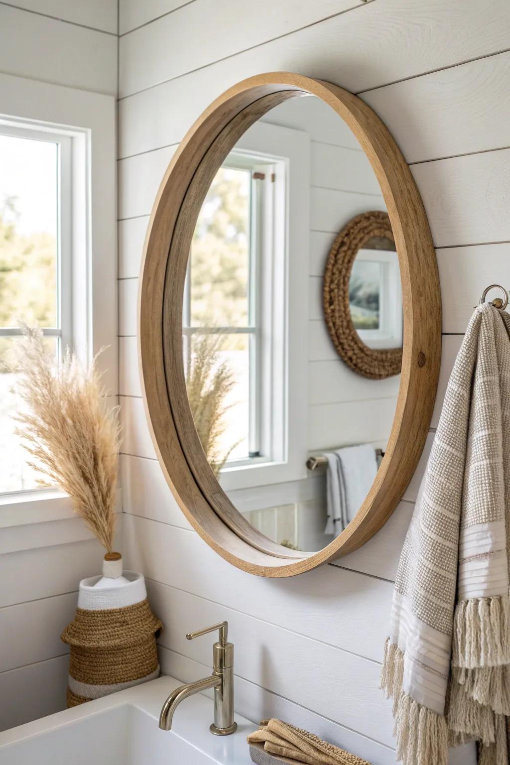 Light wood framing warms a small farmhouse bathroom—bright, minimal, and effortlessly cozy.