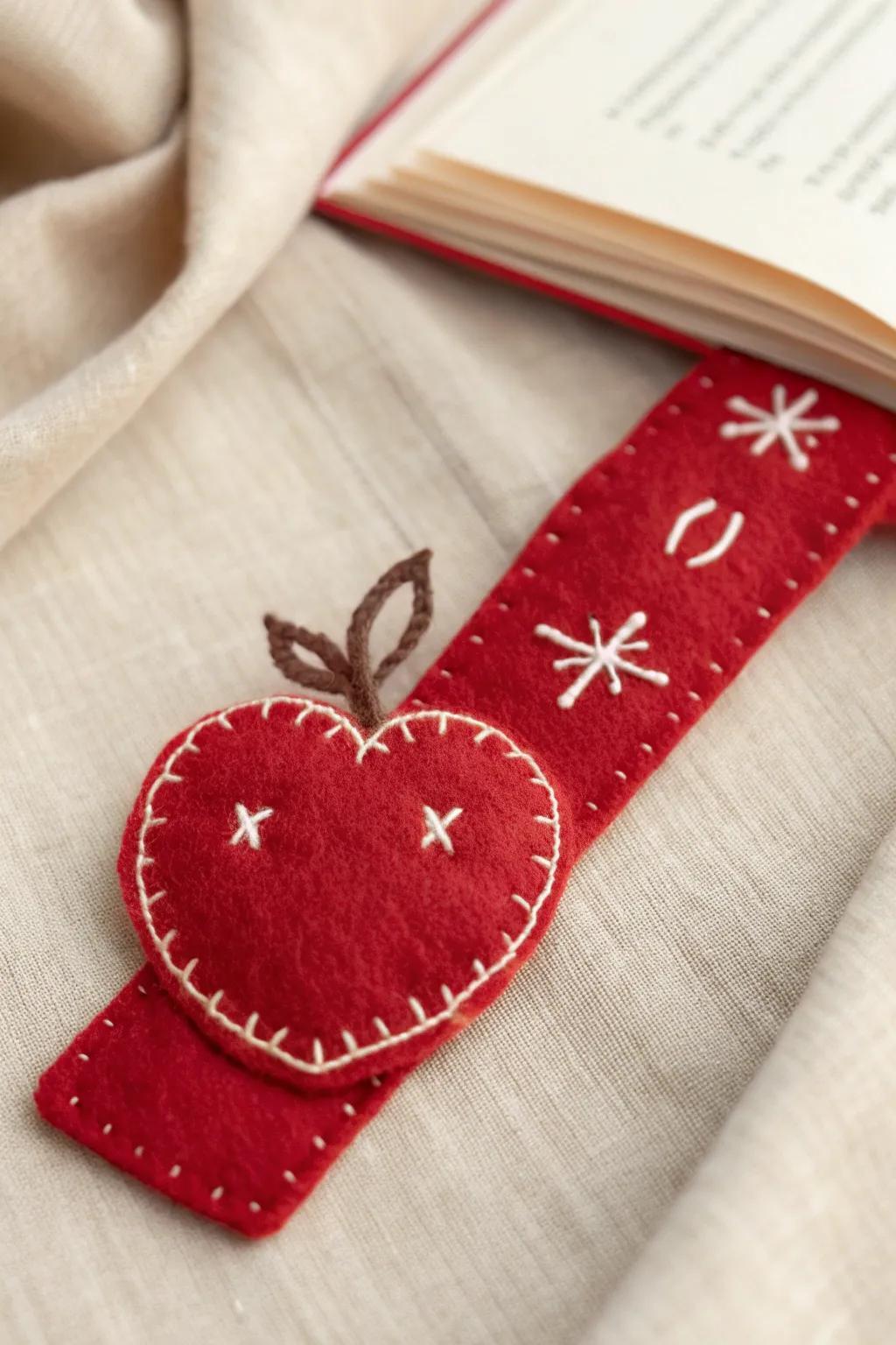 Add a touch of handcrafted charm to your reading with this felted apple bookmark, perfect for math enthusiasts and book lovers alike.