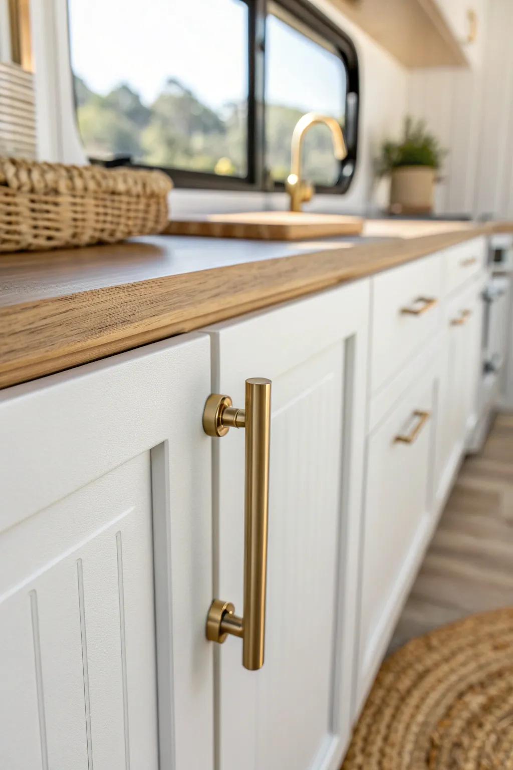 Swap in sleek brass pulls—tiny hardware upgrade that makes an RV kitchen feel brand new.