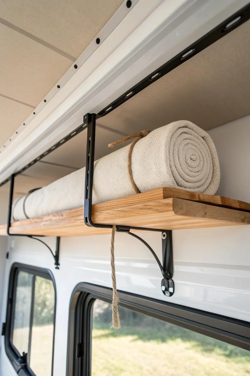 Ceiling loft shelf keeps tarps and drop cloths up top—freeing precious trailer floor space.