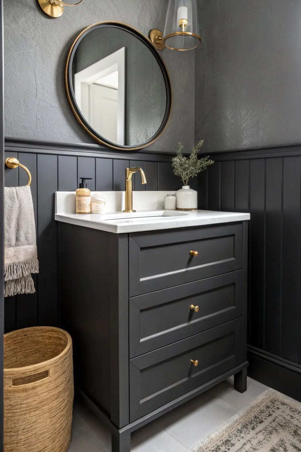 A moody monochrome half-bath vanity that looks custom—minimal lines, warm brass, high contrast.