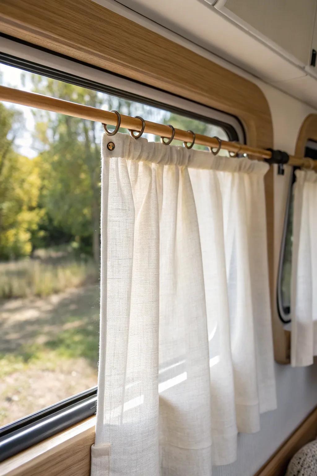 No-drill tension rod + airy linen: the simplest, renter-friendly RV window curtain upgrade.