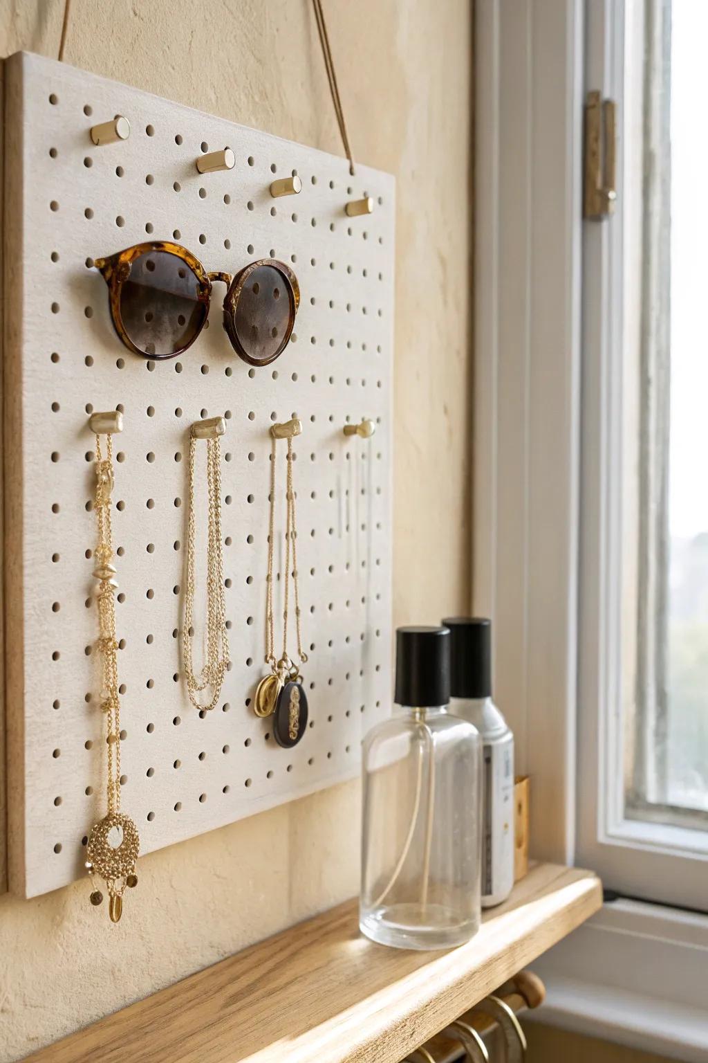 A pegboard jewelry wall that keeps necklaces tangle-free and makes sunglasses look like decor.