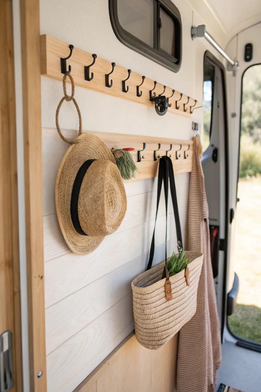 Turn one camper wall into a chic gear parking strip—tidy floors, calm vibes.