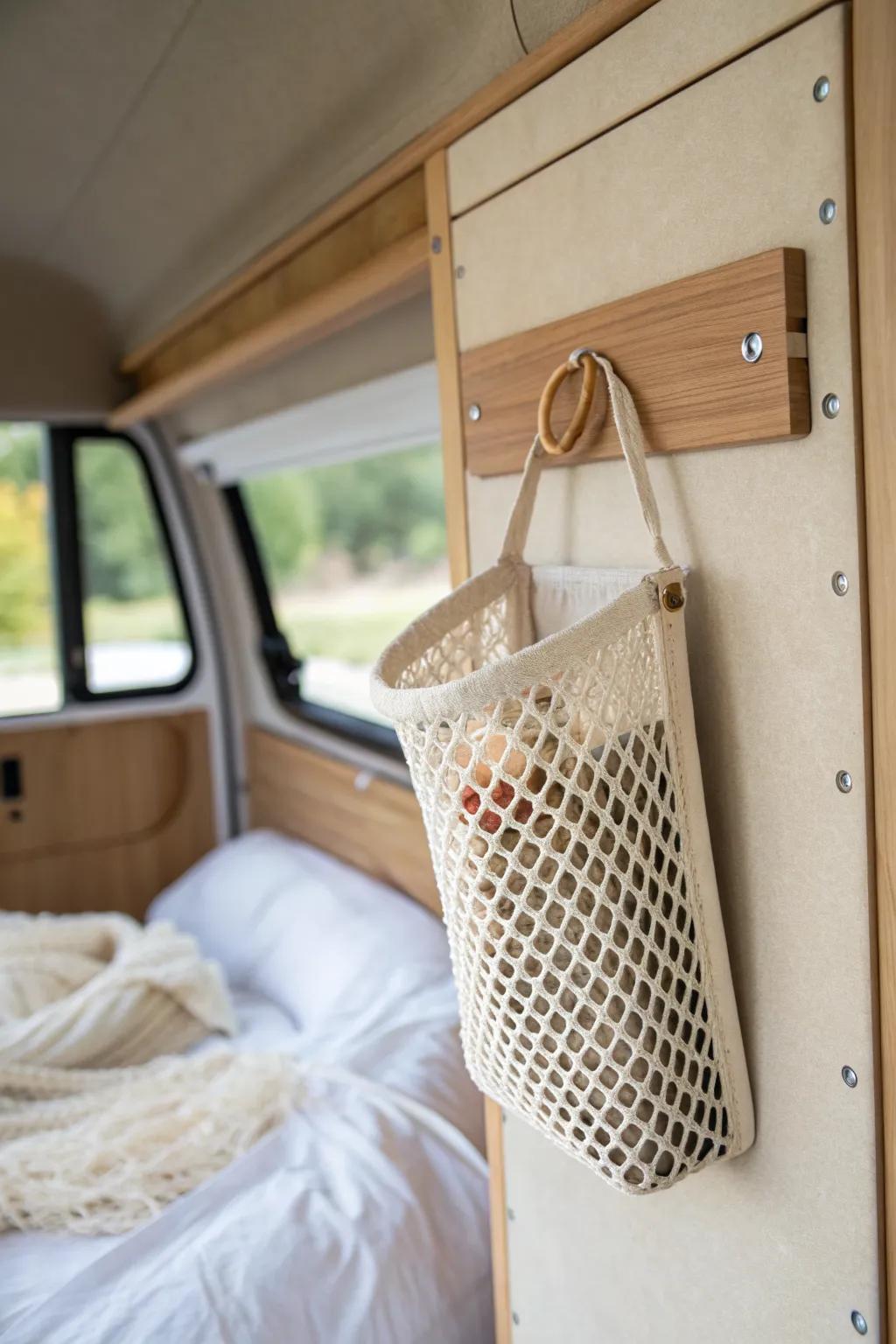 A breathable mesh pouch turns a tiny van corner into tidy storage for essentials.