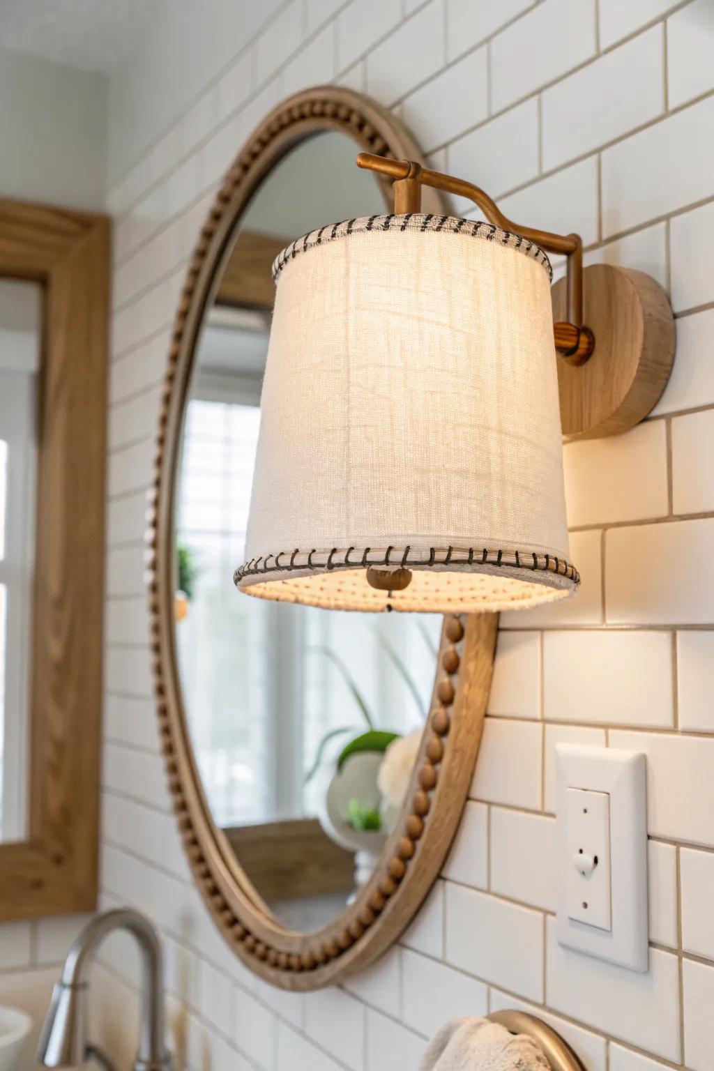 Warm up harsh bathroom lighting with a DIY linen shade—soft glow, calm vibe, instant upgrade.