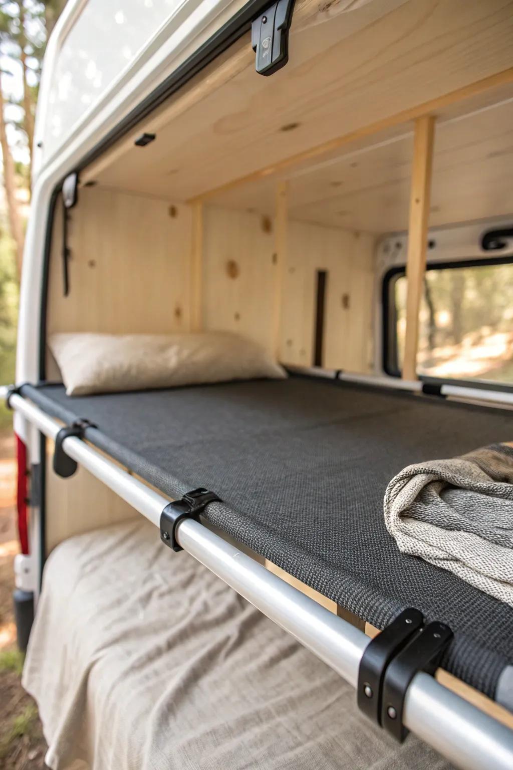 A sleek mesh sling bunk on E-track—lightweight, supportive, and beautifully minimal.