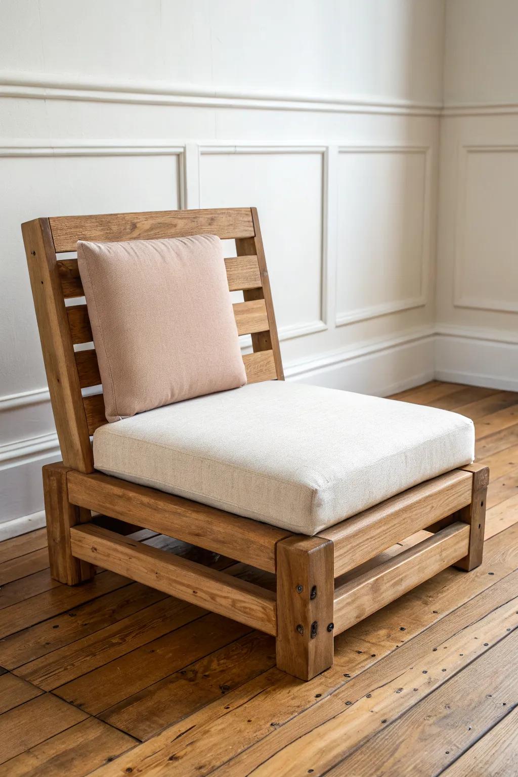 Low Japanese-inspired pallet chair with a simple linen pad—sleek, cozy, and small-space friendly.