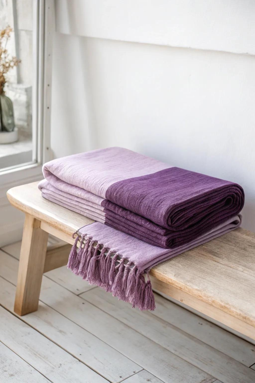 Lilac + plum in one handcrafted throw—an easy way to unify a shared purple dorm.