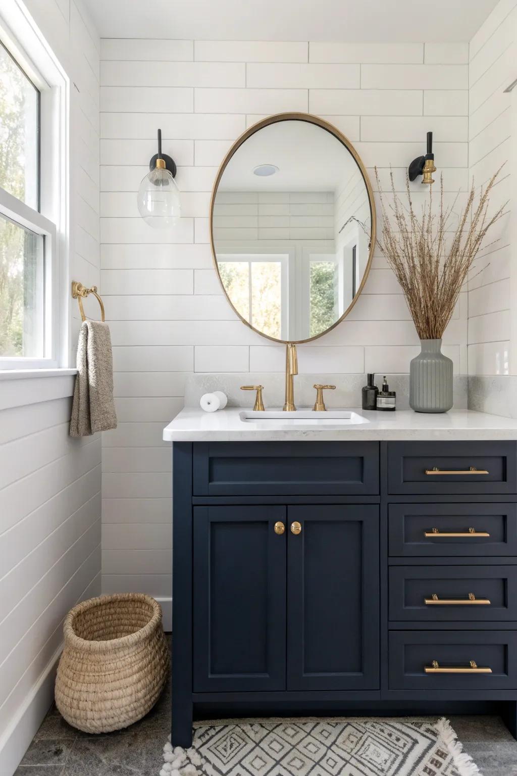 Monochrome magic: a dark blue vanity that makes a tiny bathroom feel calm and boutique.