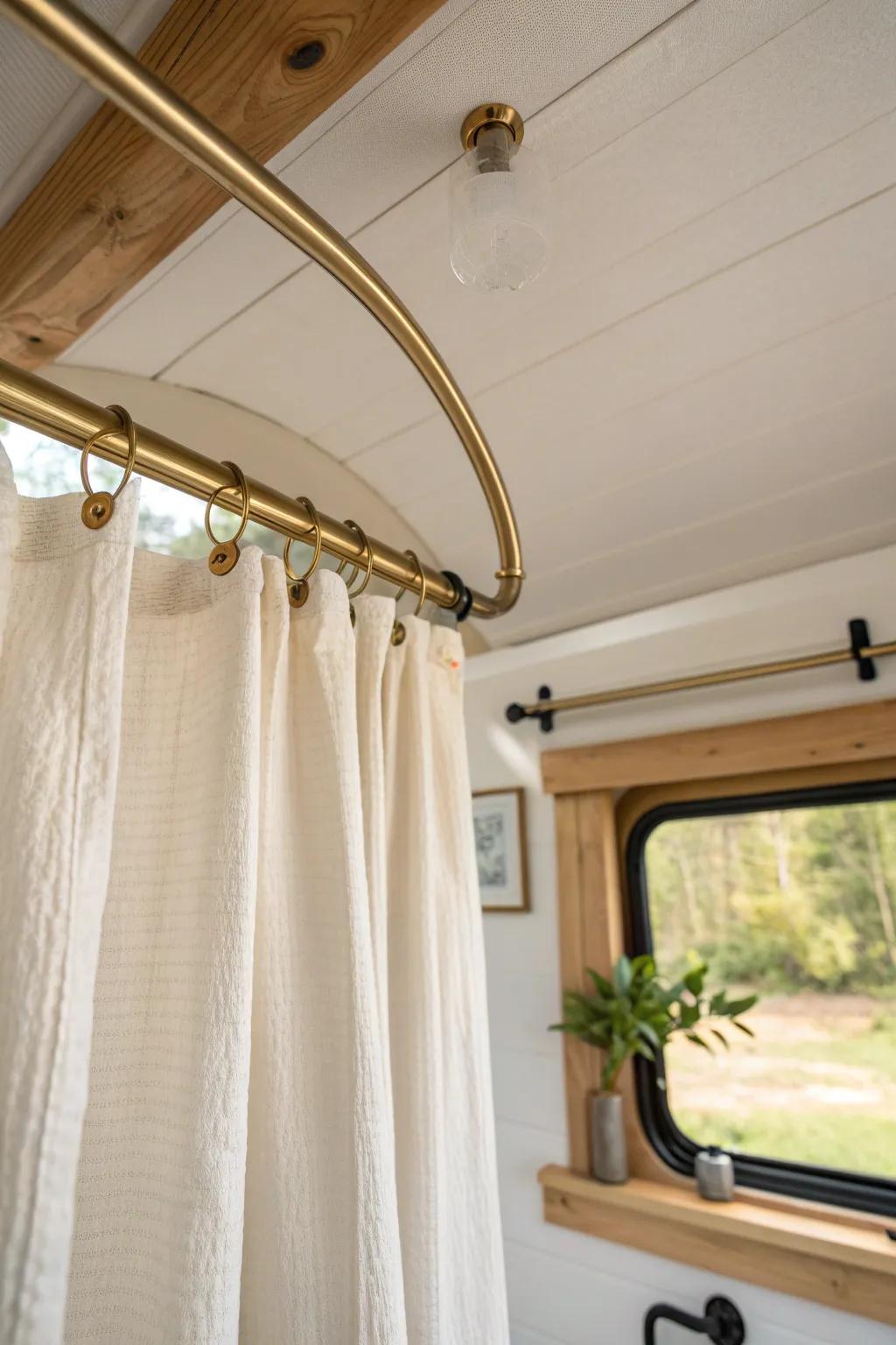 A ceiling track curtain creates an instant van shower—then slides away to open the space.
