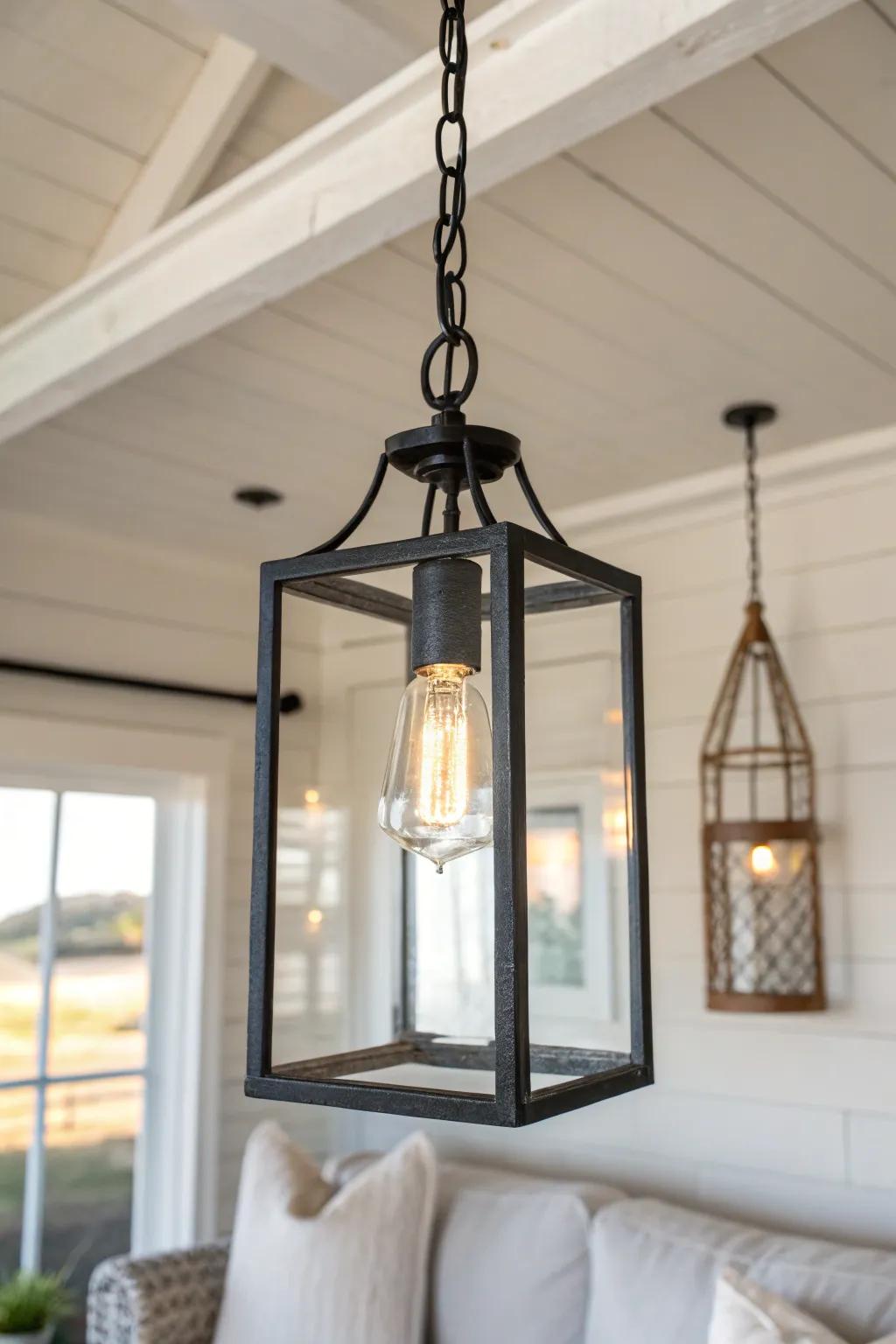 Lantern pendant lighting adds farmhouse charm while keeping surfaces clear in small rooms.