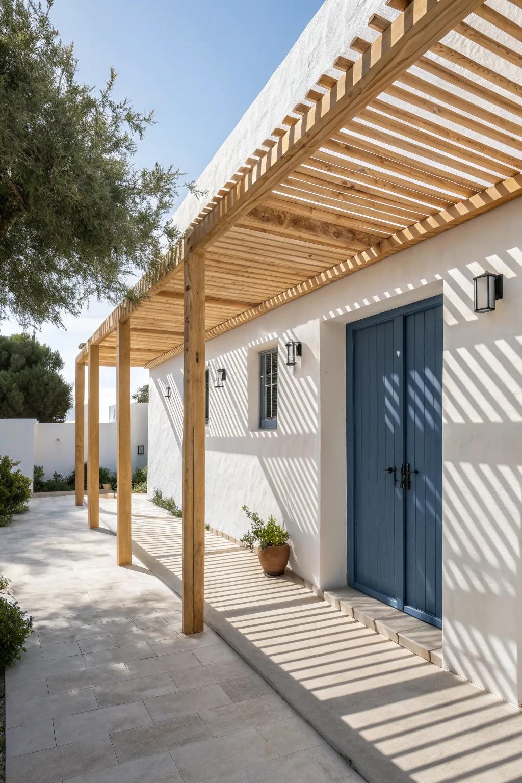Slatted pergola shade that keeps a narrow side-yard patio bright, airy, and beautifully defined.