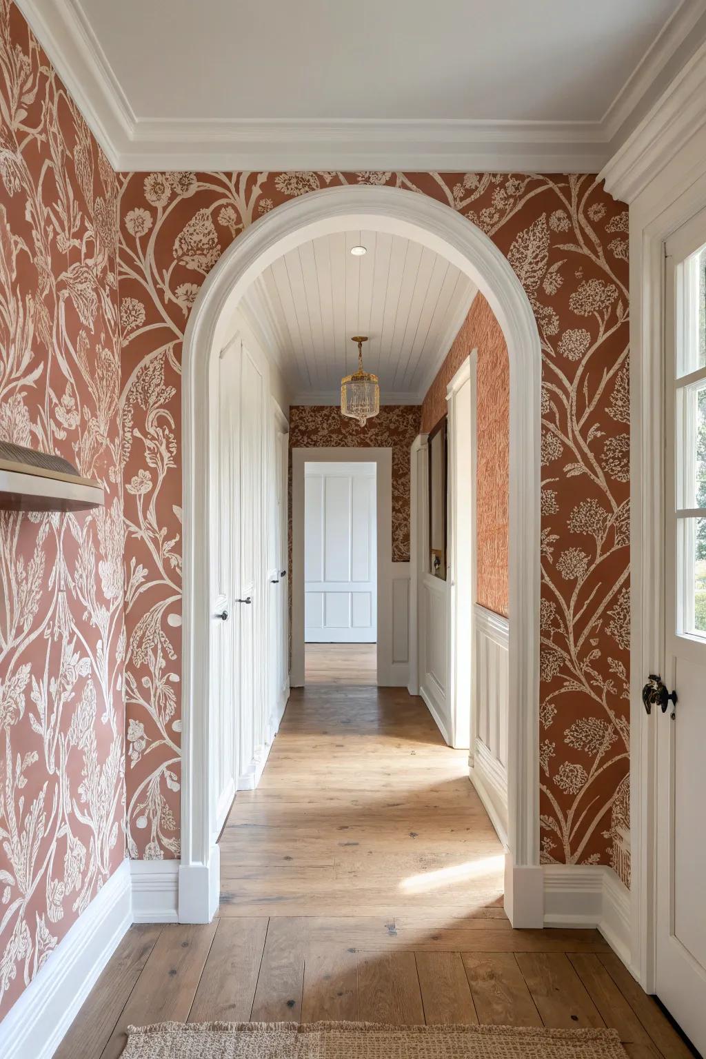 Wallpaper just inside an arch adds a sweet, built-in look—big impact for a small hallway.