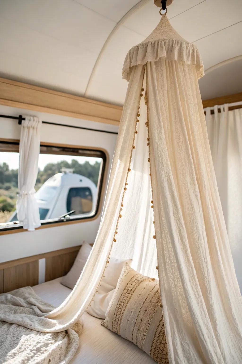 A lightweight linen ceiling canopy turns a tiny 5th wheel bedroom into a dreamy sleep nook.