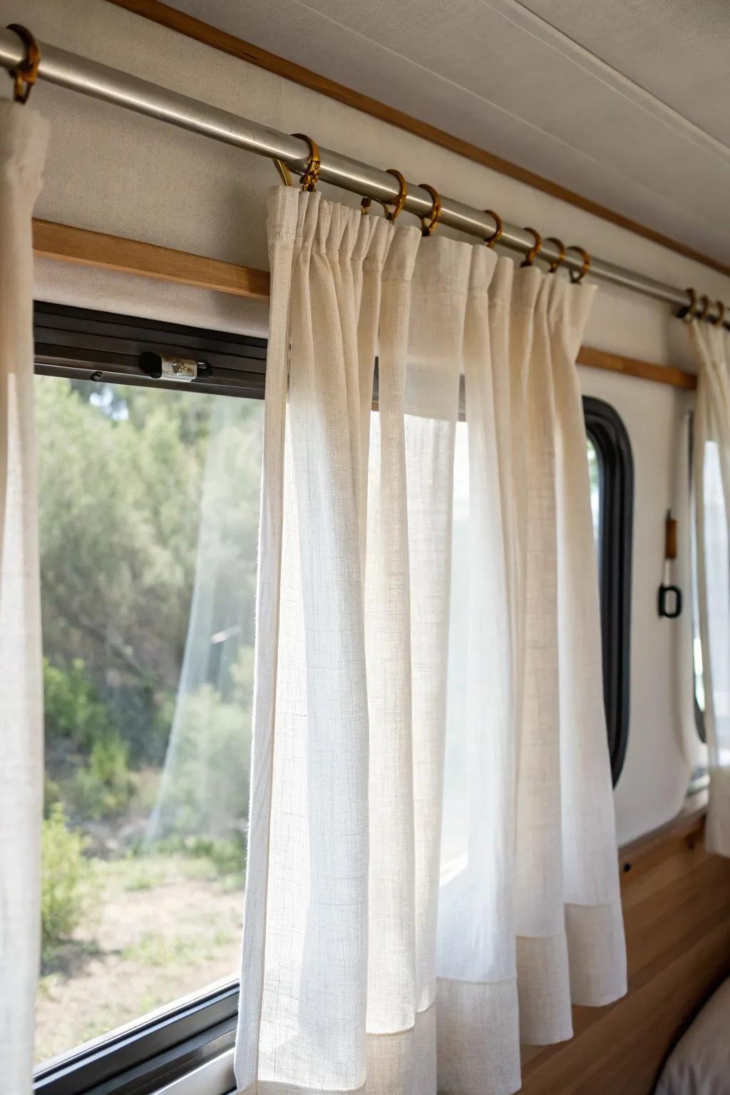 Sheer + blackout layers: bright days, cozy-dark nights—luxury comfort for tiny camper windows.