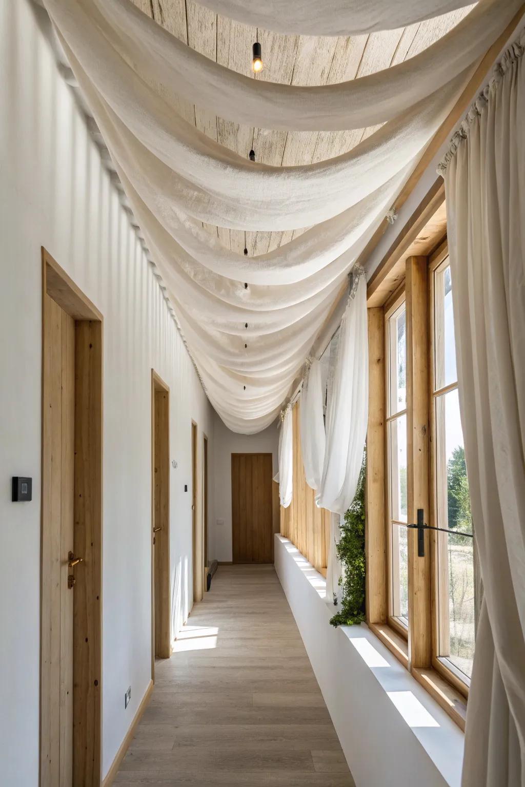 Drape airy linen in soft ceiling waves to hush echo and add boutique-hotel charm.