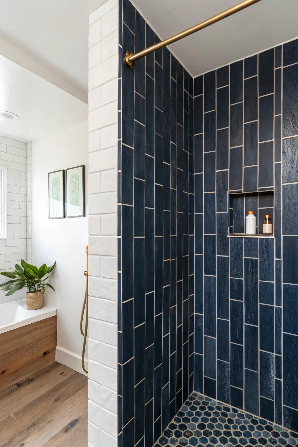 Vertical dark blue tiles make a tiny bathroom feel taller—clean, modern, and quietly luxe.