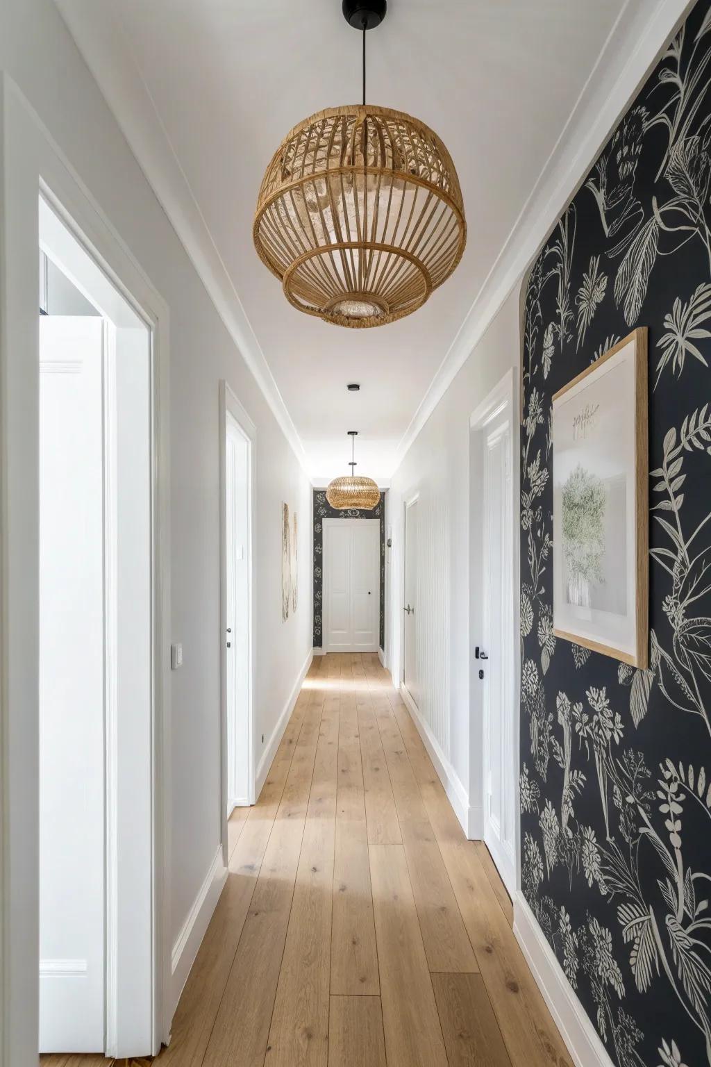 Ceiling wallpaper + a woven pendant pulls the eye up and makes a small hallway feel taller.