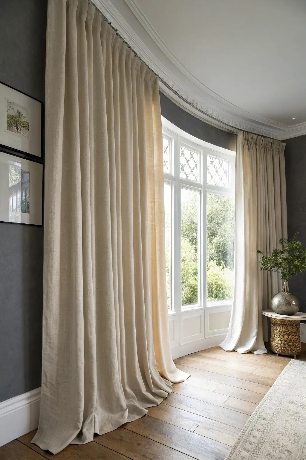 Extra-wide linen bay curtains double as a soft divider—cozy nook, instant privacy.