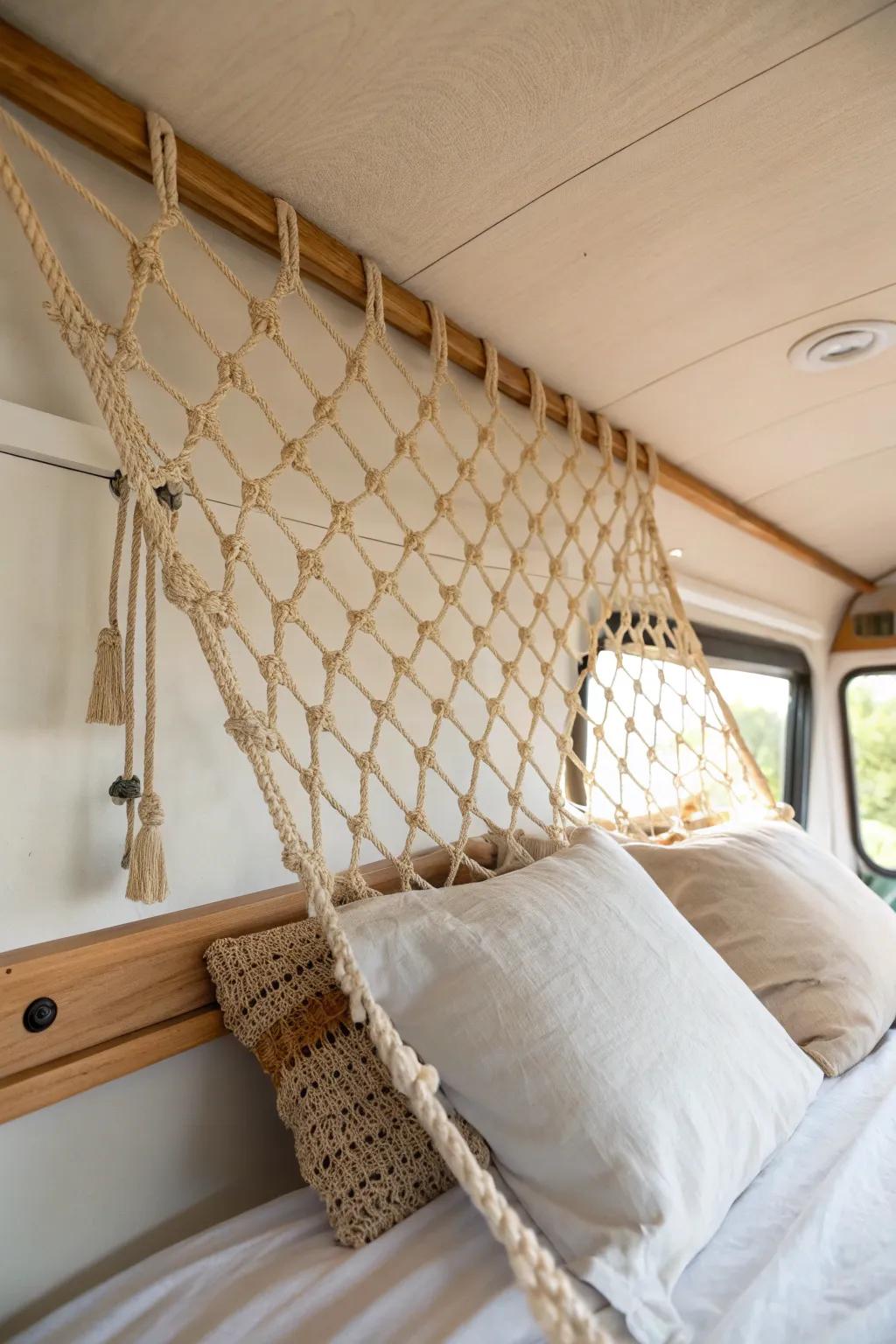 An overhead pillow net keeps spare bedding neatly tucked away, opening up a calmer camper sleep space.