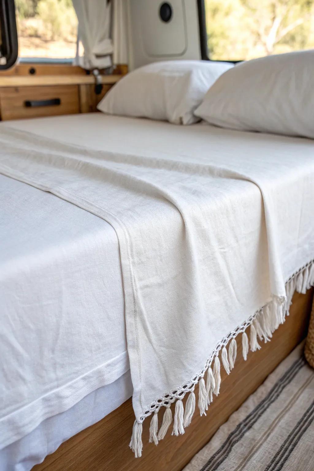 No-tuck flat sheet: tidy camper bedding that stays smooth without fighting tight walls.