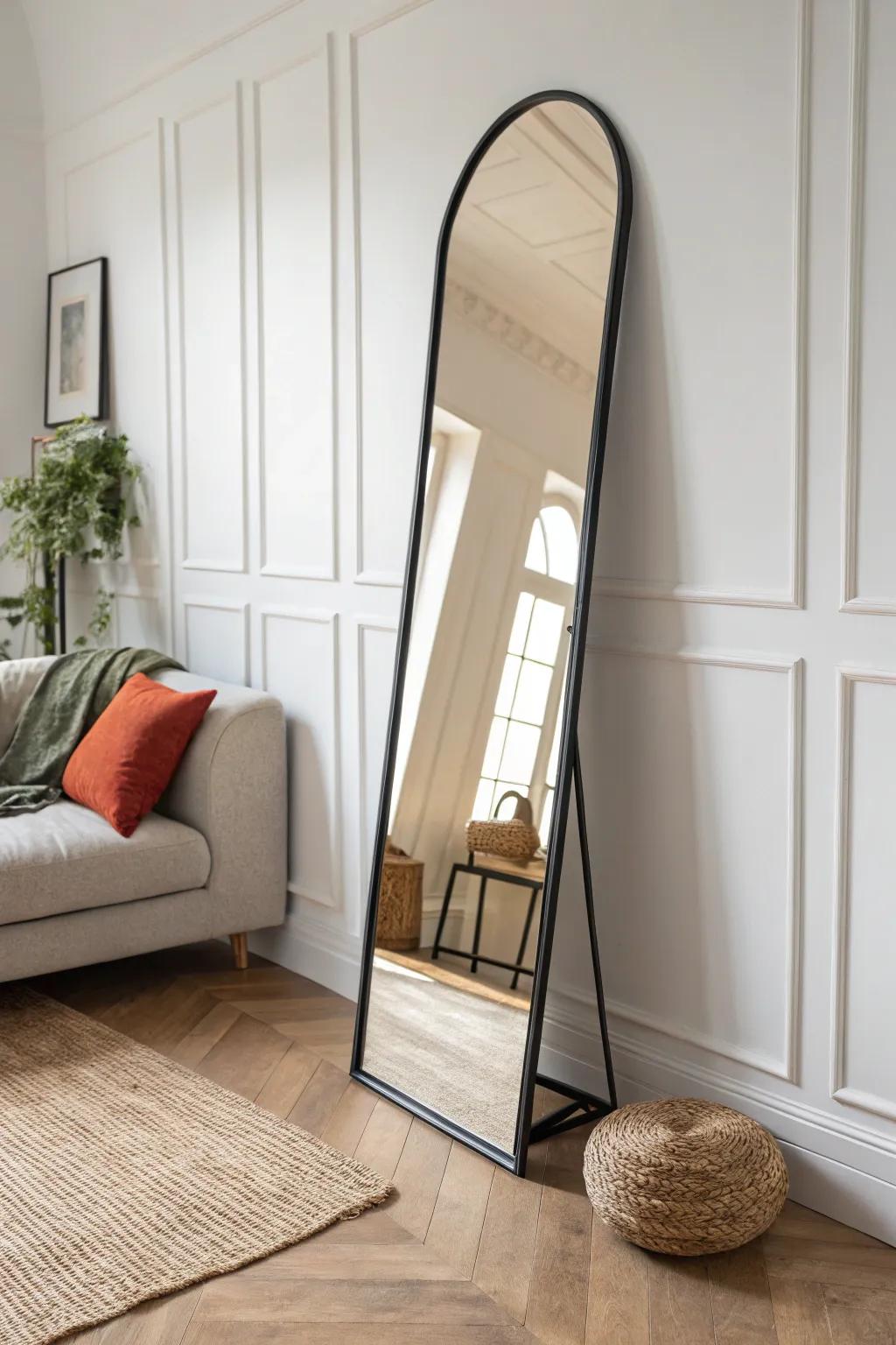 Lean a tall mirror on the diagonal to turn an awkward corner into a chic focal point.