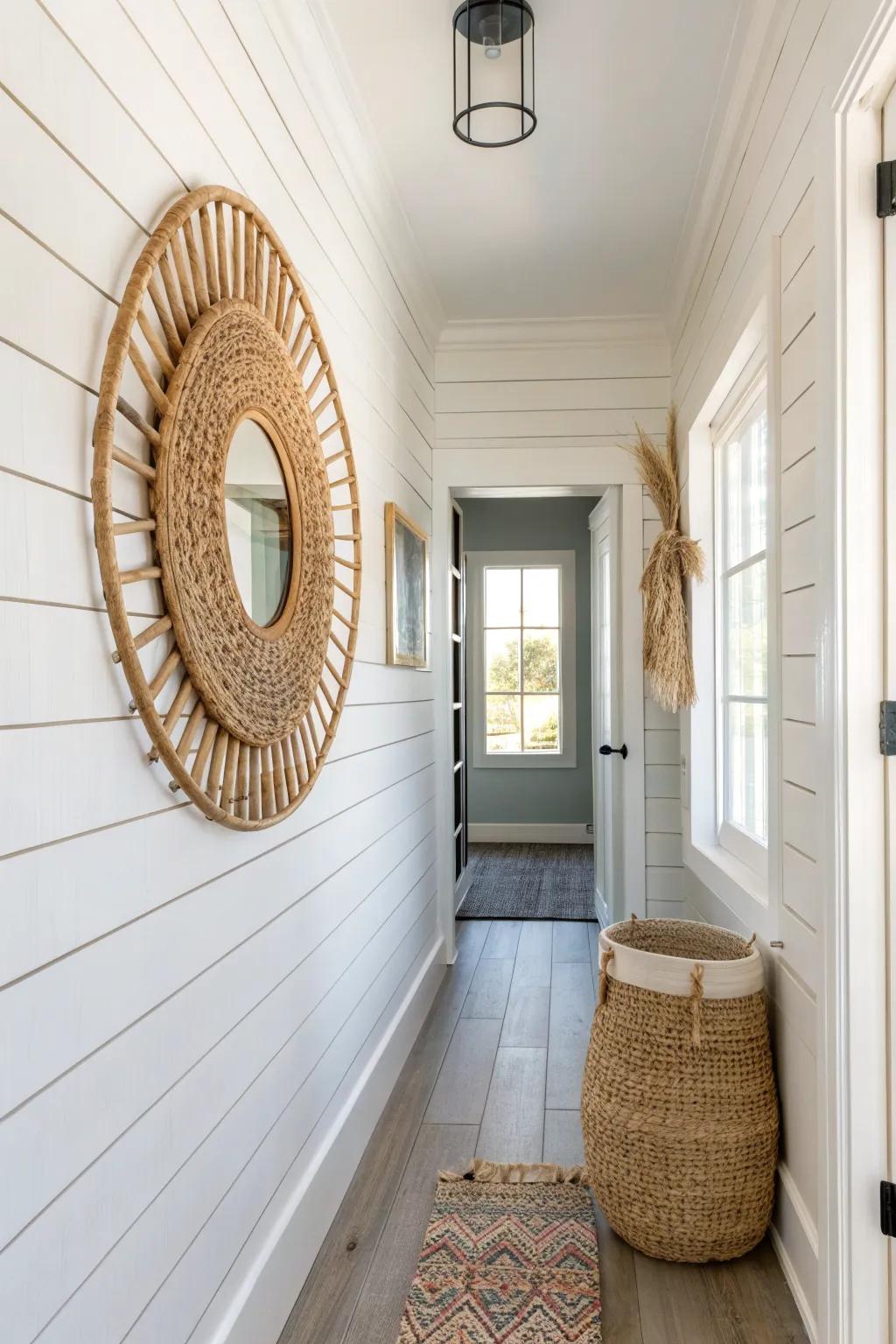 Removable shiplap + a simple rattan mirror brings farmhouse charm to the smallest hallway.