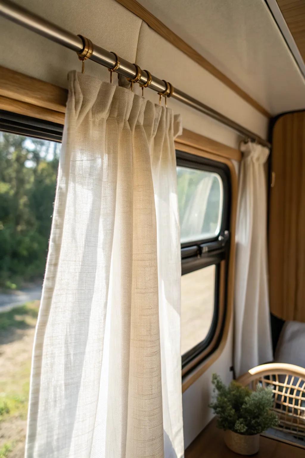 Airy linen curtains brighten RV windows and instantly make the space feel taller and lighter.
