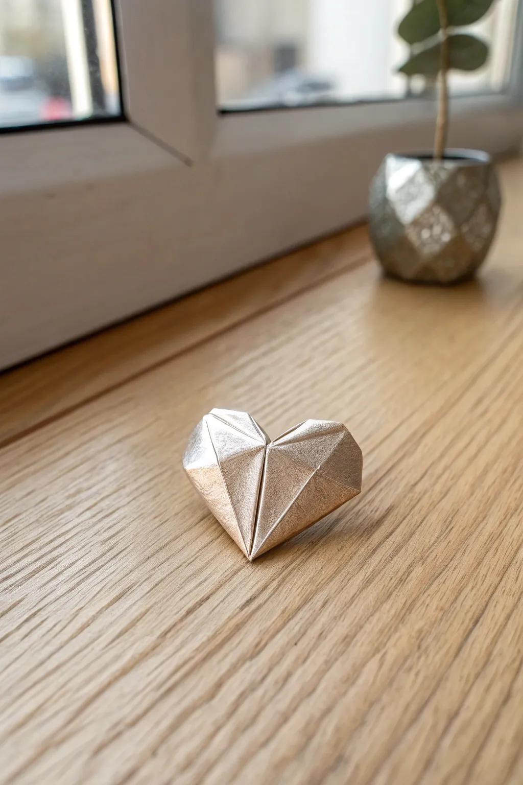 Crafted with love: a shimmering origami heart from a simple gum wrapper.
