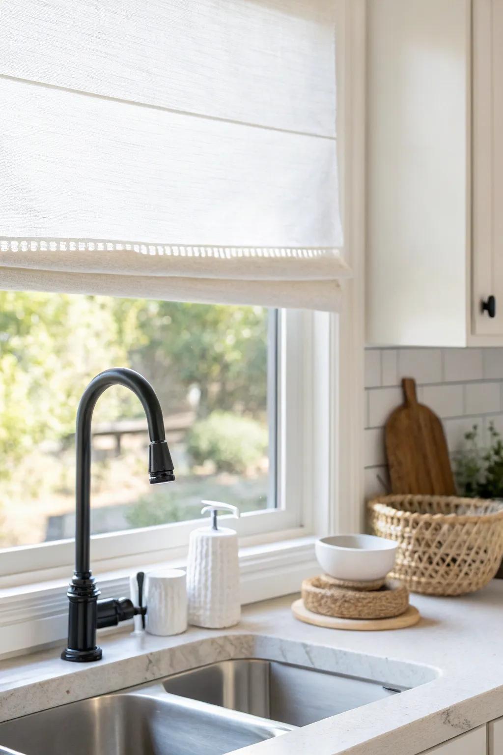 A clean roller shade keeps a small sink window crisp, splash-friendly, and clutter-free.