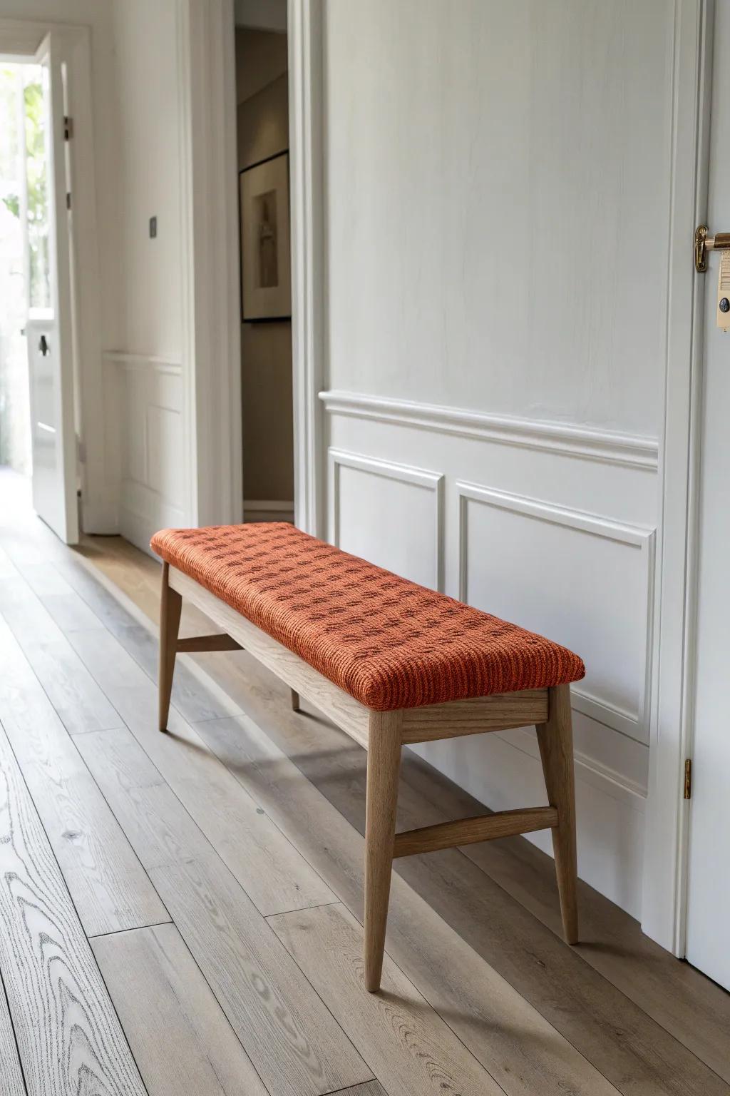 Slim backless bench = hallway seating without crowding—minimal, crafted, and cozy.