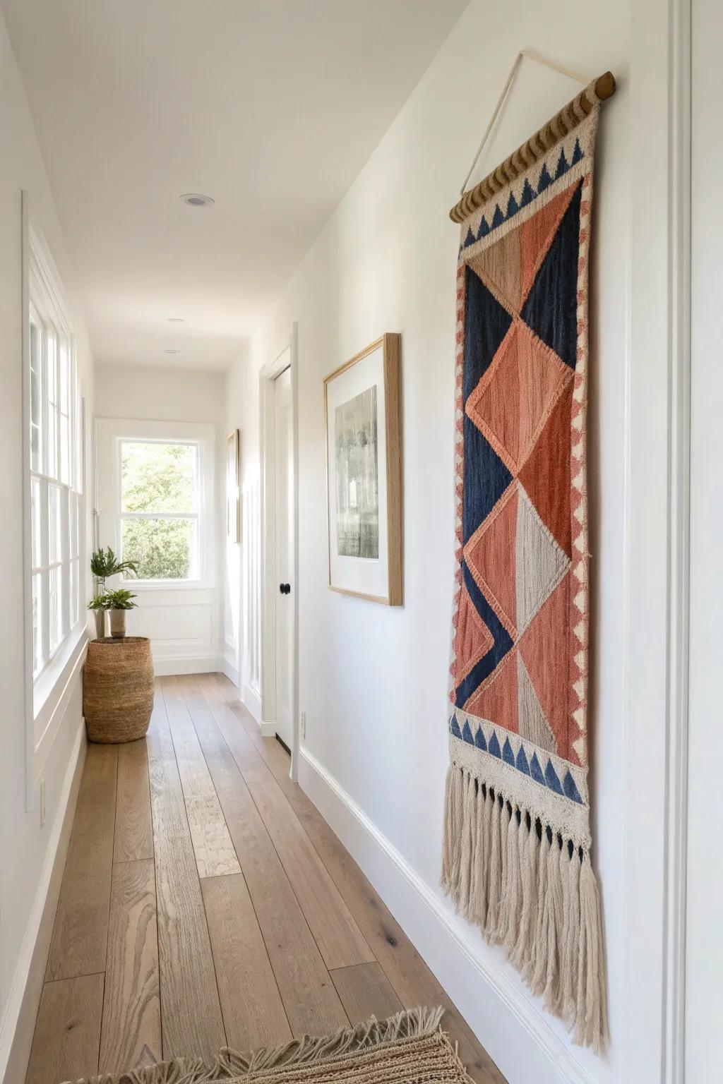 One oversized artwork turns a tunnel-like hallway into a bold, room-like focal point.