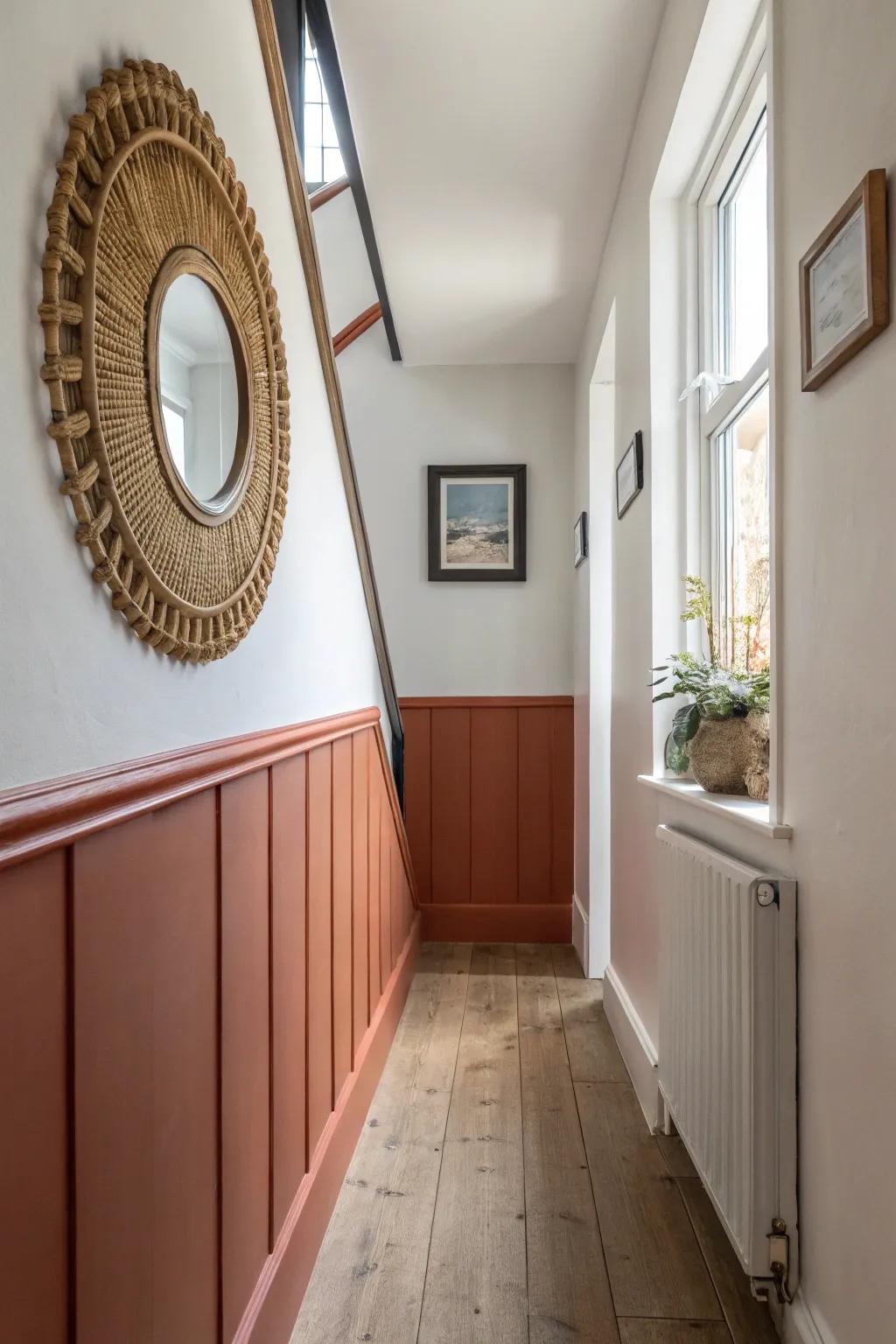 Two-tone walls + one statement mirror: big character for small hallways, zero clutter.