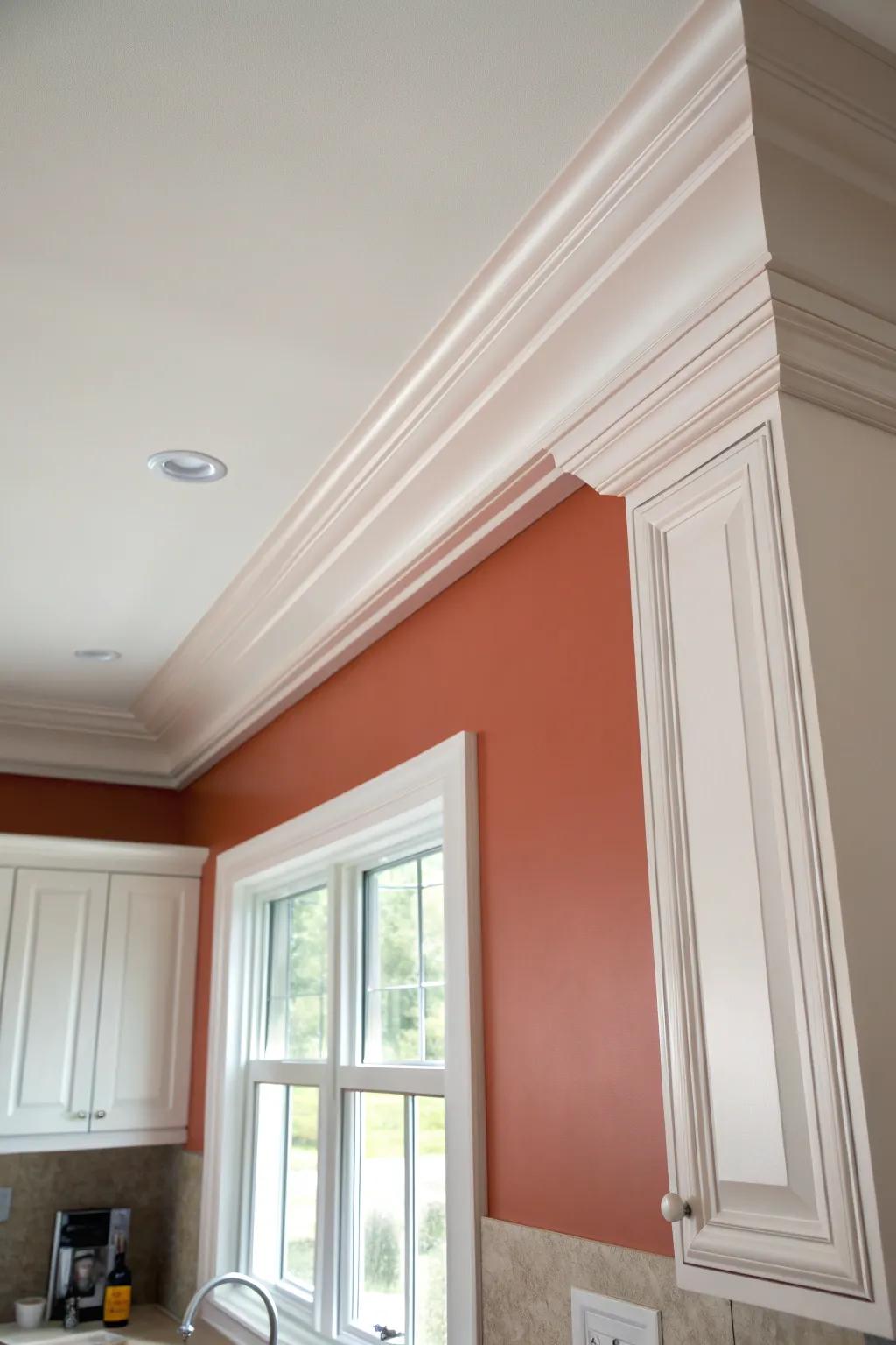Slim crown molding gives a finished look while keeping a low-ceiling kitchen feeling airy.