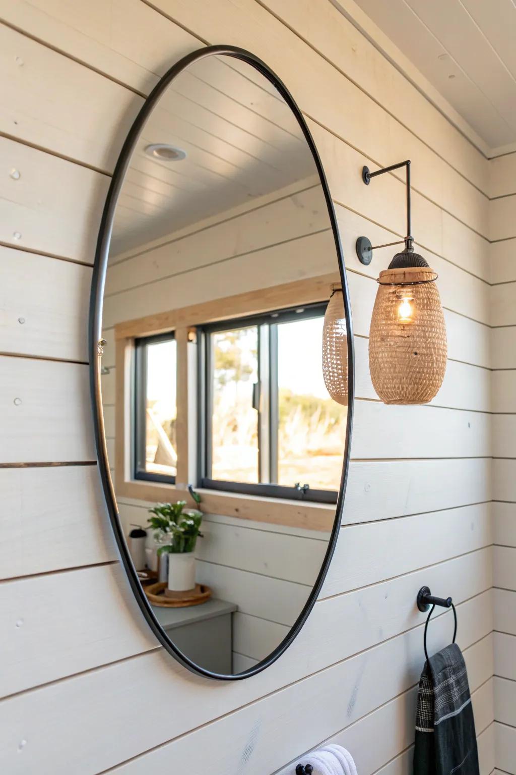 An oversized mirror instantly brightens and doubles the feel of a narrow mobile home bath.