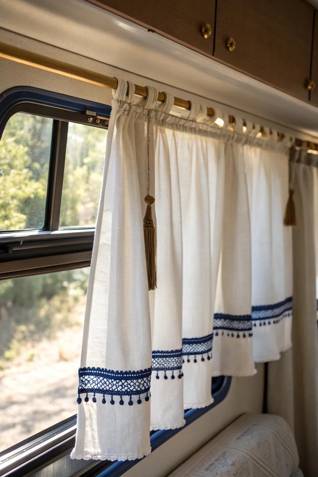 Linen café curtains add cozy privacy to your RV dinette while keeping light streaming in.
