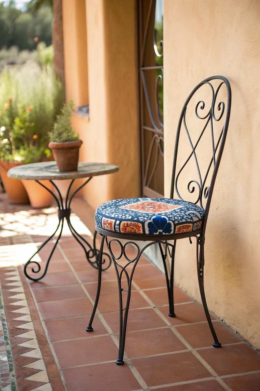 Airy wrought-iron bistro chair + bold Talavera cushion: a small Mexican patio staple.