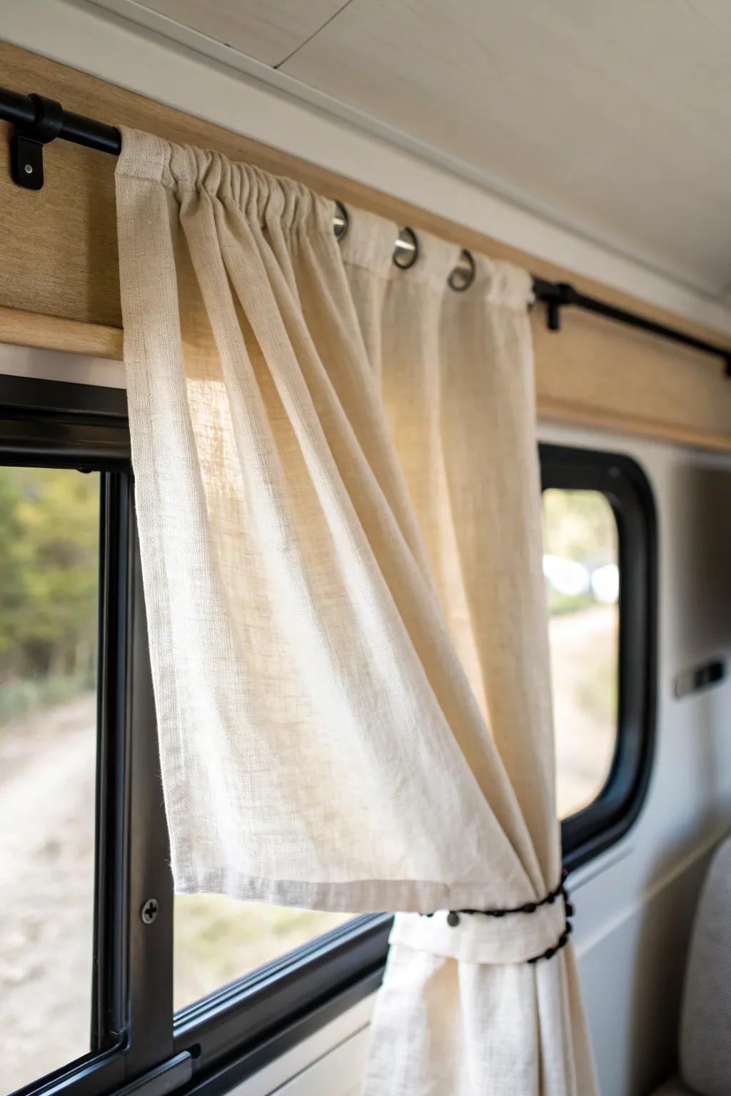 Simple linen curtains add instant privacy and soften light inside your camper shell.