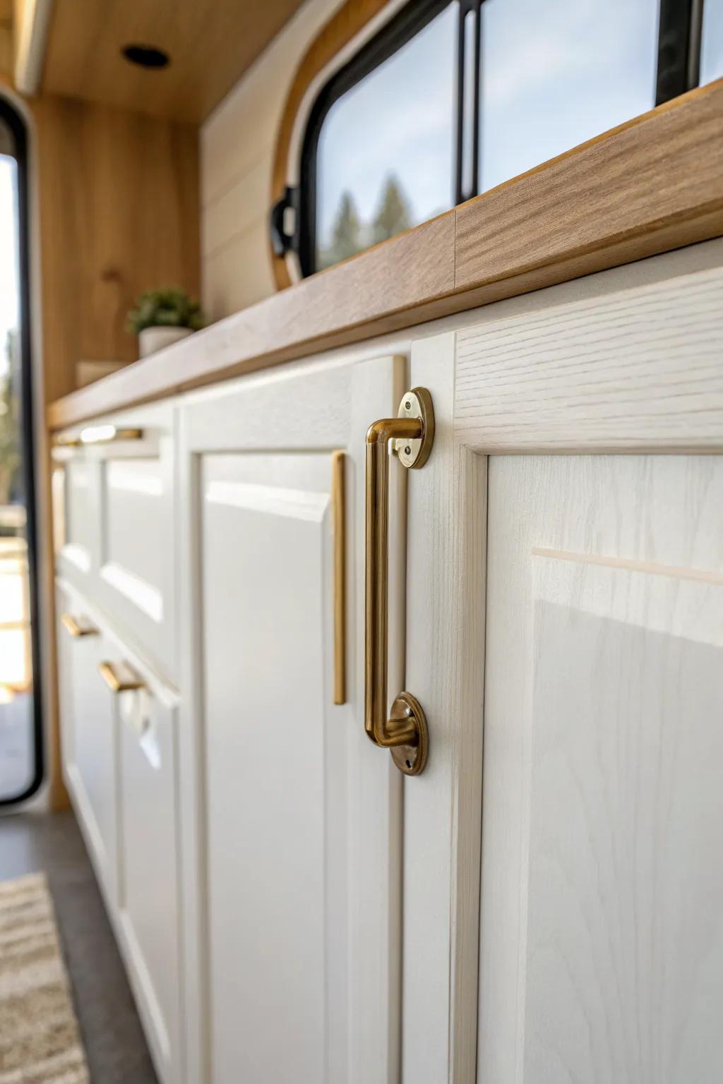 A simple brass pull instantly modernizes RV cabinets—small upgrade, big impact.
